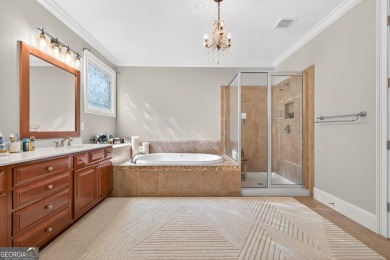 Located within the exclusive Reunion Country Club, this on Reunion Golf Club in Georgia - for sale on GolfHomes.com, golf home, golf lot