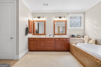 Located within the exclusive Reunion Country Club, this on Reunion Golf Club in Georgia - for sale on GolfHomes.com, golf home, golf lot