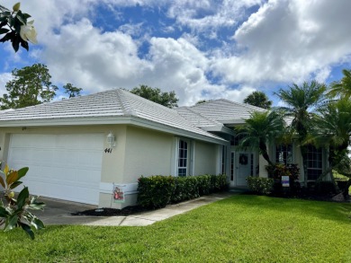 NEW ROOF, BRAND NEW GAS WATER  HEATER & AC UNIT w/ infrared on St. Lucie Trail Golf Club in Florida - for sale on GolfHomes.com, golf home, golf lot