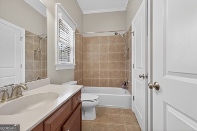 Located within the exclusive Reunion Country Club, this on Reunion Golf Club in Georgia - for sale on GolfHomes.com, golf home, golf lot
