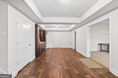 Located within the exclusive Reunion Country Club, this on Reunion Golf Club in Georgia - for sale on GolfHomes.com, golf home, golf lot