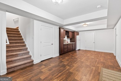 Located within the exclusive Reunion Country Club, this on Reunion Golf Club in Georgia - for sale on GolfHomes.com, golf home, golf lot