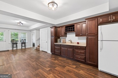 Located within the exclusive Reunion Country Club, this on Reunion Golf Club in Georgia - for sale on GolfHomes.com, golf home, golf lot