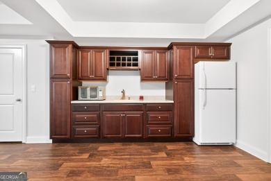 Located within the exclusive Reunion Country Club, this on Reunion Golf Club in Georgia - for sale on GolfHomes.com, golf home, golf lot