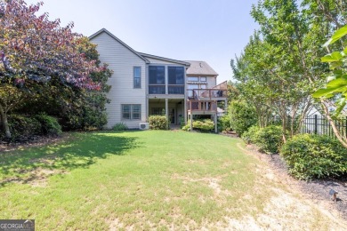 Located within the exclusive Reunion Country Club, this on Reunion Golf Club in Georgia - for sale on GolfHomes.com, golf home, golf lot