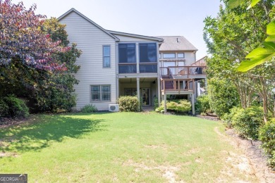 Located within the exclusive Reunion Country Club, this on Reunion Golf Club in Georgia - for sale on GolfHomes.com, golf home, golf lot