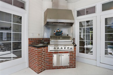 Welcome to this exquisite 5,360 sq. ft. Southern-style estate on Haile Plantation Golf and Country Club in Florida - for sale on GolfHomes.com, golf home, golf lot