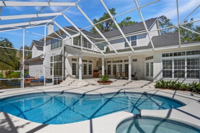 Welcome to this exquisite 5,360 sq. ft. Southern-style estate on Haile Plantation Golf and Country Club in Florida - for sale on GolfHomes.com, golf home, golf lot