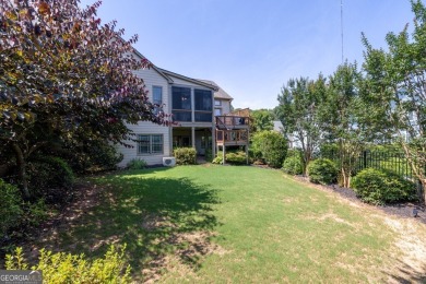 Located within the exclusive Reunion Country Club, this on Reunion Golf Club in Georgia - for sale on GolfHomes.com, golf home, golf lot