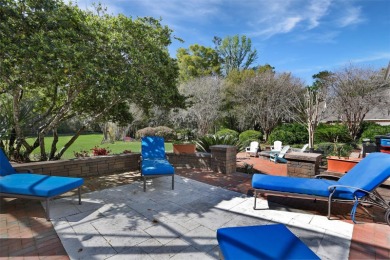 Welcome to this exquisite 5,360 sq. ft. Southern-style estate on Haile Plantation Golf and Country Club in Florida - for sale on GolfHomes.com, golf home, golf lot