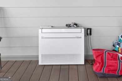 Located within the exclusive Reunion Country Club, this on Reunion Golf Club in Georgia - for sale on GolfHomes.com, golf home, golf lot