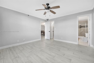 Remodeled apartment with stunning golf course and lake views! on Grande Oaks Golf Club in Florida - for sale on GolfHomes.com, golf home, golf lot