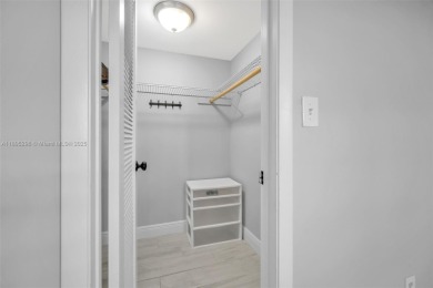 Remodeled apartment with stunning golf course and lake views! on Grande Oaks Golf Club in Florida - for sale on GolfHomes.com, golf home, golf lot