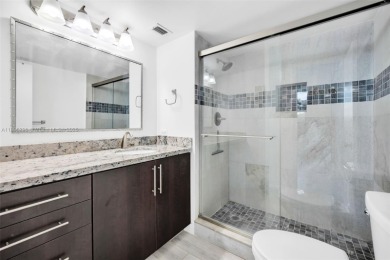 Remodeled apartment with stunning golf course and lake views! on Grande Oaks Golf Club in Florida - for sale on GolfHomes.com, golf home, golf lot