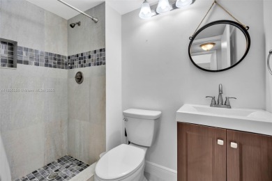 Remodeled apartment with stunning golf course and lake views! on Grande Oaks Golf Club in Florida - for sale on GolfHomes.com, golf home, golf lot