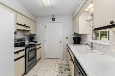 PRICE ADJUSTMENT ON THIS RETIREMENT DREAM in this 55+ community on The Links of Spruce Creek in Florida - for sale on GolfHomes.com, golf home, golf lot