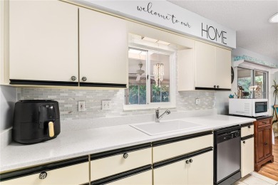 PRICE ADJUSTMENT ON THIS RETIREMENT DREAM in this 55+ community on The Links of Spruce Creek in Florida - for sale on GolfHomes.com, golf home, golf lot