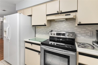 PRICE ADJUSTMENT ON THIS RETIREMENT DREAM in this 55+ community on The Links of Spruce Creek in Florida - for sale on GolfHomes.com, golf home, golf lot