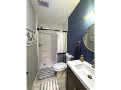 This home is located within a 55 + resort style leased land on Big Cypress Golf and Country Club in Florida - for sale on GolfHomes.com, golf home, golf lot