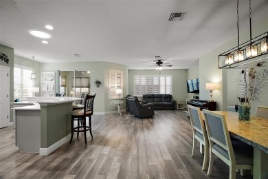 BOND PAID! STUNNING TURNKEY SOMERSET MODEL WITH GOLF CART on The Links of Spruce Creek in Florida - for sale on GolfHomes.com, golf home, golf lot