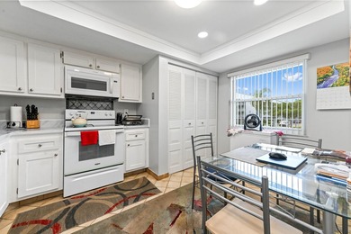 Discover this bright and beautifully maintained 2-bedroom on Oriole Golf and Tennis Club in Florida - for sale on GolfHomes.com, golf home, golf lot