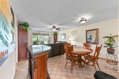 Discover this bright and beautifully maintained 2-bedroom on  in Florida - for sale on GolfHomes.com, golf home, golf lot