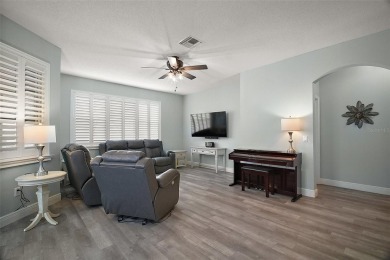 BOND PAID! STUNNING TURNKEY SOMERSET MODEL WITH GOLF CART on The Links of Spruce Creek in Florida - for sale on GolfHomes.com, golf home, golf lot