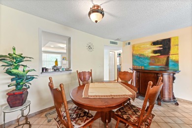 Discover this bright and beautifully maintained 2-bedroom on  in Florida - for sale on GolfHomes.com, golf home, golf lot