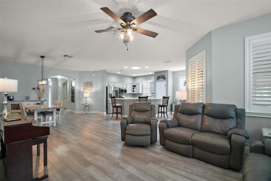 BOND PAID! STUNNING TURNKEY SOMERSET MODEL WITH GOLF CART on The Links of Spruce Creek in Florida - for sale on GolfHomes.com, golf home, golf lot