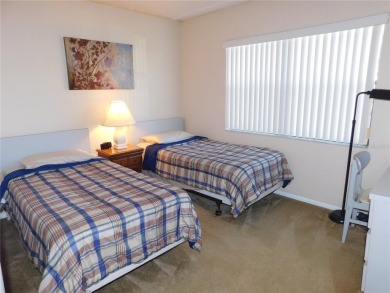 First floor end unit condo located in the Woodlake Run area of on East Lake Woodlands Country Club in Florida - for sale on GolfHomes.com, golf home, golf lot