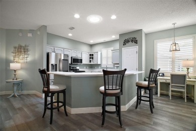 BOND PAID! STUNNING TURNKEY SOMERSET MODEL WITH GOLF CART on The Links of Spruce Creek in Florida - for sale on GolfHomes.com, golf home, golf lot