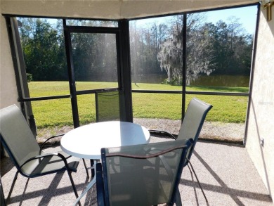 First floor end unit condo located in the Woodlake Run area of on East Lake Woodlands Country Club in Florida - for sale on GolfHomes.com, golf home, golf lot