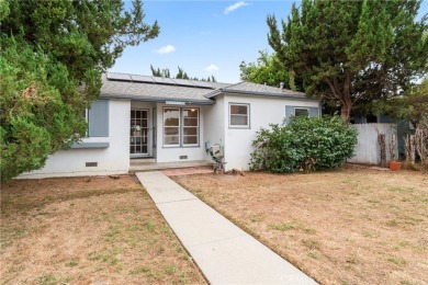 Charming single-story residence in quaint upscale neighborhood on Van Nuys Golf Course in California - for sale on GolfHomes.com, golf home, golf lot