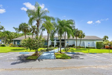 Discover this bright and beautifully maintained 2-bedroom on  in Florida - for sale on GolfHomes.com, golf home, golf lot