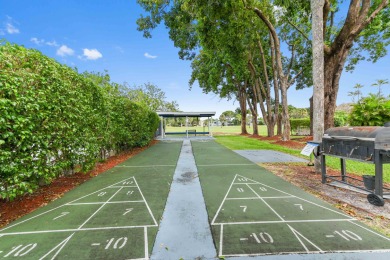 Discover this bright and beautifully maintained 2-bedroom on  in Florida - for sale on GolfHomes.com, golf home, golf lot