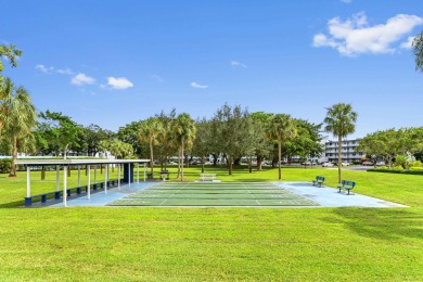 Discover this bright and beautifully maintained 2-bedroom on  in Florida - for sale on GolfHomes.com, golf home, golf lot