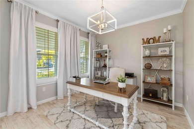 Discover refined Florida living in this beautifully updated pool on Esplanade Golf and Country at Lakewood Ranch in Florida - for sale on GolfHomes.com, golf home, golf lot