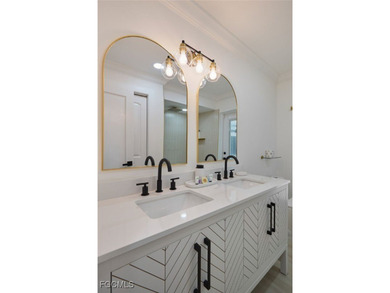 This home appraised for $1.3 million in 2024. Priced over $300 on The Dunes Golf and Tennis Club in Florida - for sale on GolfHomes.com, golf home, golf lot