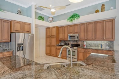 This stunning 4-bedroom, 3.5-bathroom home is a true gem nestled on Serenoa Golf Club in Florida - for sale on GolfHomes.com, golf home, golf lot