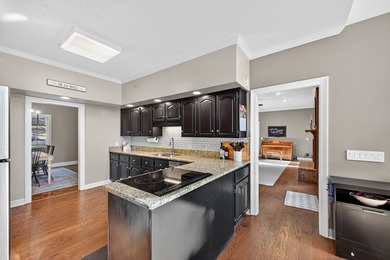 Welcome to this gorgeous 5-bedroom, 3.5-bathroom brick home on Houndslake Country Club in South Carolina - for sale on GolfHomes.com, golf home, golf lot