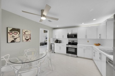 Elegant 3B/R 2 Bath villa. 2500 sq ft of living space. Lake view on Boca Lago Golf and Country Club in Florida - for sale on GolfHomes.com, golf home, golf lot