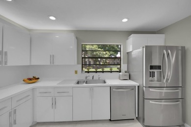 Elegant 3B/R 2 Bath villa. 2500 sq ft of living space. Lake view on Boca Lago Golf and Country Club in Florida - for sale on GolfHomes.com, golf home, golf lot