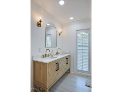 This home appraised for $1.3 million in 2024. Priced over $300 on The Dunes Golf and Tennis Club in Florida - for sale on GolfHomes.com, golf home, golf lot