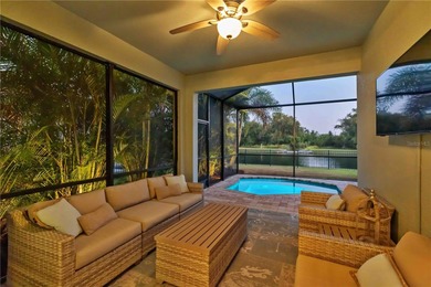 Discover refined Florida living in this beautifully updated pool on Esplanade Golf and Country at Lakewood Ranch in Florida - for sale on GolfHomes.com, golf home, golf lot