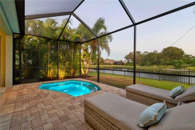 Discover refined Florida living in this beautifully updated pool on Esplanade Golf and Country at Lakewood Ranch in Florida - for sale on GolfHomes.com, golf home, golf lot