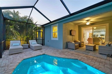 Discover refined Florida living in this beautifully updated pool on Esplanade Golf and Country at Lakewood Ranch in Florida - for sale on GolfHomes.com, golf home, golf lot