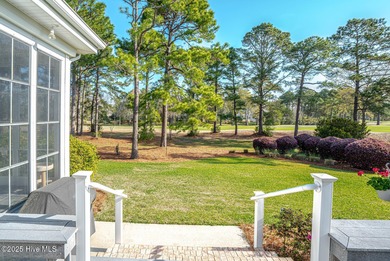 Beautiful low-maintenance brick home with amazing curb appeal on Ocean Ridge Plantation in North Carolina - for sale on GolfHomes.com, golf home, golf lot