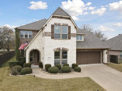 Beautiful 2-story brick and stone home perfectly situated on a on Mansfield National Golf Club in Texas - for sale on GolfHomes.com, golf home, golf lot