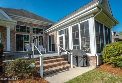 Beautiful low-maintenance brick home with amazing curb appeal on Ocean Ridge Plantation in North Carolina - for sale on GolfHomes.com, golf home, golf lot