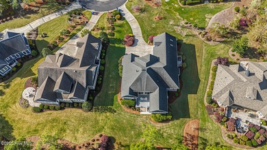 Beautiful low-maintenance brick home with amazing curb appeal on Ocean Ridge Plantation in North Carolina - for sale on GolfHomes.com, golf home, golf lot